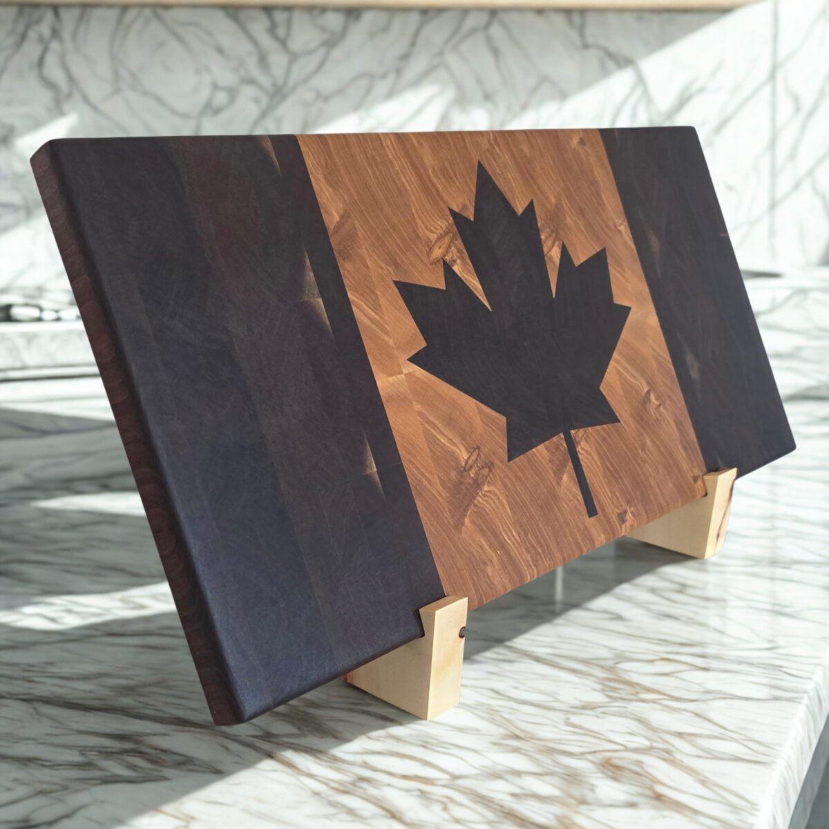 Canadian flag end grain cutting board with maple leaf inlay