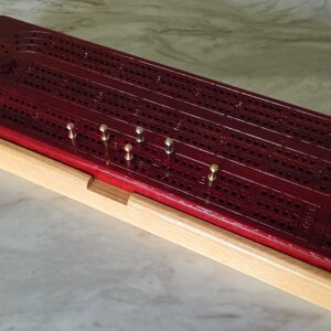 Custom crib board with magnetic storage base