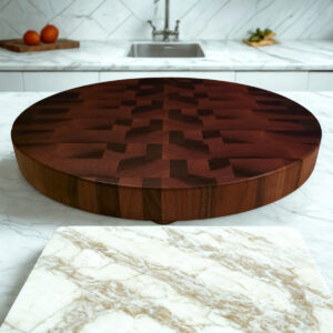 Walnut cutting board Compass Series sitting on a counter