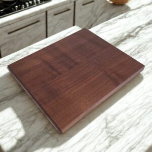 Close-up of walnut homestead cutting board edge showing thickness and grain detail