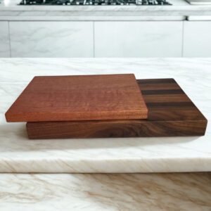 Side profile of walnut homestead cutting board with cabin board showing thickness and grain