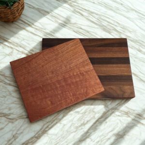 Hearth Series cutting board set featuring walnut homestead and cherry cabin boards in modern kitchen